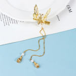 Liblikas juuksen&otilde;el iidse stiiliga tutt, astmeline raputusklamber pardnokk-klamber