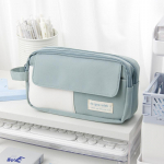 Lihtne suure mahutavusega pliiatsikott uus keskkooli s&uuml;nnip&auml;eva osakonna kirjatarvete kott &otilde;pilasele v&auml;ike punane sama vanema kooli stiilis t&otilde;mblukuga