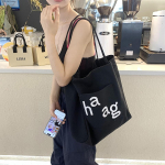 Suure mahutavusega &uuml;hev&auml;rviline l&otilde;uendist kott naistele lukuga pehme &otilde;lakott kotid t&uuml;drukutele ostukott kirjamood