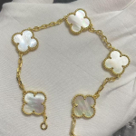 Uus versioon Neljaleheline ristik Viie &otilde;iega k&auml;ev&otilde;ru Naturaalne punane ahhaat Valge p&auml;rlmutter K&auml;ev&otilde;ru Naiste laserk&auml;ev&otilde;ru V Gold