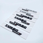 3D Korter Fo Turbo 4matic 4matic+ Pluss Embleem Mercedes Benzi jaoks AMG GT E53 GLE53 A35 A45 CLA35 CLA45 GLA45 Auto Poritiiva K&uuml;lgkleebis glossy black gray