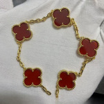 Uus versioon Neljaleheline ristik Viie &otilde;iega k&auml;ev&otilde;ru Naturaalne punane ahhaat Valge p&auml;rlmutter K&auml;ev&otilde;ru Naiste laserk&auml;ev&otilde;ru V Gold