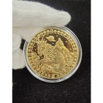 Kaksteist t&auml;htkuju m&auml;lestusmedalit Hambahaldjas kuldm&uuml;ndid 12 sodiaagiga k&auml;sit&ouml;&ouml;na valmistatud Euroopa ja Ameerika m&uuml;nti &Otilde;nneliku eestkostja t&auml;htkuju m&uuml;ndid