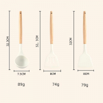 Piimvalge puidust k&auml;epidemega silikoonist spaatliga k&ouml;&ouml;gin&otilde;ud 3-osaline silikoonlabida komplekt Ripputav k&ouml;&ouml;gisupi lusikas keedun&otilde;u spaatel