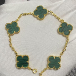 Uus versioon Neljaleheline ristik Viie &otilde;iega k&auml;ev&otilde;ru Naturaalne punane ahhaat Valge p&auml;rlmutter K&auml;ev&otilde;ru Naiste laserk&auml;ev&otilde;ru V Gold