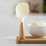 1 tk Silikoonist riisi lusikas Kuumakindel toidukvaliteediga silikoon riisilabidas Mittenakkuv riisipliit k&ouml;&ouml;giriist Kodumajapidamises kasutatava riisi lusikas