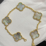 Uus versioon Neljaleheline ristik Viie &otilde;iega k&auml;ev&otilde;ru Naturaalne punane ahhaat Valge p&auml;rlmutter K&auml;ev&otilde;ru Naiste laserk&auml;ev&otilde;ru V Gold