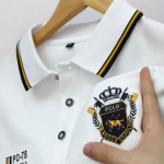 Meeste polo s&auml;rk rev&auml;&auml;riga pikkade varrukatega s&uuml;gisene embleemi tikandiga T-s&auml;rk klassikaline &auml;ri stiilne meeste riietus M valge