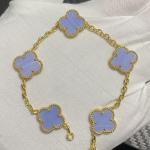 Uus versioon Neljaleheline ristik Viie &otilde;iega k&auml;ev&otilde;ru Naturaalne punane ahhaat Valge p&auml;rlmutter K&auml;ev&otilde;ru Naiste laserk&auml;ev&otilde;ru V Gold