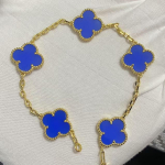 Uus versioon Neljaleheline ristik Viie &otilde;iega k&auml;ev&otilde;ru Naturaalne punane ahhaat Valge p&auml;rlmutter K&auml;ev&otilde;ru Naiste laserk&auml;ev&otilde;ru V Gold