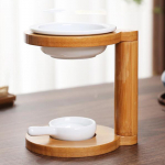 Eeterliku &otilde;li p&otilde;leti soojendaja k&uuml;&uuml;nlahoidjaga keraamilise hajuti aroomiga magamistuppa