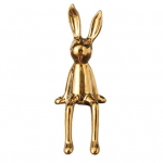 Istuv j&auml;nes kujuke pikad k&otilde;rvad j&auml;nku vaigu kuju skulptuur kodukontori raamaturiiul t&ouml;&ouml;laud valge