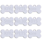 100 tk luukujulist koera ID-m&auml;rgist graveerimisega Lemmiklooma koera ID-m&auml;rgised Kaelarihmad Luu Nimi Numbrim&auml;rgid Kohandatud Anodeeritud alumiinium Kutsika m&auml;rk 31X21X1mm h&otilde;be
