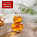 L&auml;bipaistev k&otilde;rvitsakujuline k&otilde;rge borosilikaatklaasist veinipudel kuumakindel klaas t&uuml;hi pudel kaanega piimateepudel k&uuml;lmpruulitud