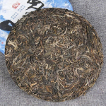 Yunnani k&auml;&auml;ritamata Puer teekook 357g Shen Puerh Bing Cha Raw Qizi koogitee
