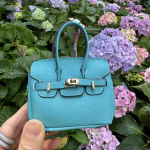 Mini v&auml;ikese kotiripatsiga k&otilde;rvaklappide komplekt auto v&otilde;tmehoidja Loominguline m&uuml;ndiripats koos k&otilde;igi sobivate punaste &uuml;mbristega 9x10cm