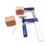 Puitplokkide ja minimutriv&otilde;tmega kitarri bassi pressimise t&ouml;&ouml;riist sinine