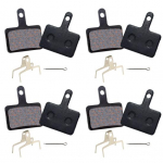 4 paari vaikse jalgratta piduriklotside soojuse hajumist Kulumiskindel vaik poolmetallist jalgratta ketaspiduriklots MTB Ebike piduriklotside vahetus