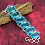 &Scaron;veitsi sinise topaasiga k&auml;sitsi valmistatud k&auml;ev&otilde;rud, 925 h&otilde;bedast ehted, v&auml;&auml;riskividega h&otilde;bedane ketiga k&auml;ev&otilde;ru, k&auml;sitsi valmistatud stiilsed ehted naistele 8 Inches With Adjustable sinine