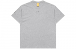 Nike Nocta graafilise tr&uuml;kiga T-s&auml;rk FN7663-063 XL hall v&auml;rv