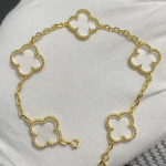 Uus versioon Neljaleheline ristik Viie &otilde;iega k&auml;ev&otilde;ru Naturaalne punane ahhaat Valge p&auml;rlmutter K&auml;ev&otilde;ru Naiste laserk&auml;ev&otilde;ru V Gold