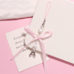 &Otilde;rn roosa palliga kootud paelaga vibu v&otilde;tmehoidja ripats Paelad kikis&otilde;lme v&otilde;tmehoidja kottide jaoks seljakotid Telefoni amulett Telefoni rihma ornament