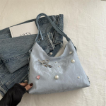 Disainitunnetusega ni&scaron;&scaron; vibuga seljakott &otilde;lakott messenger mitmeotstarbeline seljakott k&otilde;rge v&auml;&auml;rtusega suure mahutavusega ketiga kandekott valge