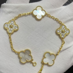 Uus versioon Neljaleheline ristik Viie &otilde;iega k&auml;ev&otilde;ru Naturaalne punane ahhaat Valge p&auml;rlmutter K&auml;ev&otilde;ru Naiste laserk&auml;ev&otilde;ru V Gold