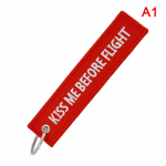 Suudle mind enne lendu V&otilde;tmehoidja Silt Tikandid Metalltasapinnaga v&otilde;tmehoidja punane