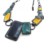 NOA [J1984] &ndash; disainerkaelakee 'Harlequin' sinine roheline kollane roheline