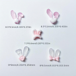 20 tk Armsad k&uuml;&uuml;likuk&otilde;rva k&uuml;&uuml;nekunsti amuletid lihav&otilde;ttep&uuml;hadeks, helendavad multifilmi k&uuml;&uuml;nte aksessuaarid, Bow Knot Love Long Ear Rabbit aksessuaarid