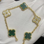 Uus versioon Neljaleheline ristik Viie &otilde;iega k&auml;ev&otilde;ru Naturaalne punane ahhaat Valge p&auml;rlmutter K&auml;ev&otilde;ru Naiste laserk&auml;ev&otilde;ru V Gold