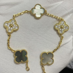 Uus versioon Neljaleheline ristik Viie &otilde;iega k&auml;ev&otilde;ru Naturaalne punane ahhaat Valge p&auml;rlmutter K&auml;ev&otilde;ru Naiste laserk&auml;ev&otilde;ru V Gold