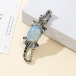 Looduskivist karbipross krokodillikujuline pross elegantseks pidulikuks mantliks ja ehteks 68x22mm 68x22mm