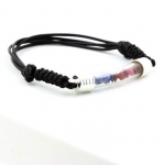 Pierres et Min&eacute;raux. Bracelet Rubis + Saphir brut. Couleur noir.