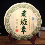 2015. aasta vana Banzhangi iidse puu toores Puer tee Vana puu puhtast materjalist k&auml;sitsi valmistatud toores Puerh tee 357 g