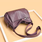 Uus luksuslik &otilde;lakott Moodk&auml;ekotid Disainkotid naistele PU-nahast rist kehaga kott &otilde;htukott lilla