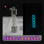 Resident Evil v&auml;lisseadme mudel helendav ripats edc V&otilde;tmehoidja helendav ripats roostevabast terasest klaasist materjal.