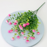 Kunstlik kameelia ja beebi hingamise lilleseade