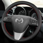 Must PU kunstnahast k&auml;sitsi &otilde;mmeldud auto roolikatte kate vanematele Mazda 3, Mazda 5, Mazda 6 mudelitele 2003-2015 Gray Thread