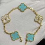 Uus versioon Neljaleheline ristik Viie &otilde;iega k&auml;ev&otilde;ru Naturaalne punane ahhaat Valge p&auml;rlmutter K&auml;ev&otilde;ru Naiste laserk&auml;ev&otilde;ru V Gold