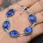 Tansaniidist kvartsist v&auml;&auml;riskivi tahke 925 sterlingh&otilde;bedast k&auml;sitsi valmistatud imeline k&auml;ev&otilde;ru 7-8 sinine