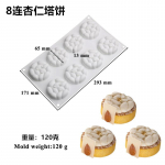 &Uuml;he mandli ja kastani tort, kaunistatud silikoonvormiga &uuml;mmarguse musta ringiga koogi magustoit