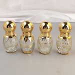 12 ml luksuslik kuldne eeterliku &otilde;li rullpudel, korduvt&auml;idetav parf&uuml;&uuml;mipudel, klaasist rullitav eeterliku &otilde;li pudeli kosmeetikakonteiner Roller Bottle