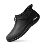 Naiste veekindlad libisemiskindlad l&uuml;hikesed vihmasaapad - Paksutallalised, mustust h&uuml;lgavad, madala l&otilde;ikega, pehmetallaga kummist kingad k&ouml;&ouml;gi- ja v&auml;listingimustes kasutamiseks. 40