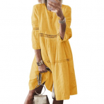 Naiste kleit, pits, &otilde;&otilde;nsad tikandid, kolmveerand varrukad, &uuml;hev&auml;rvilised avara p&otilde;lvepikkusega A-joon avara kaelusega midikleit M kollane