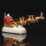 Santa in Sleigh with Flying Reindeer Ornament Figurine Glowing Art Christmas Scene Decoration for
