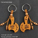 Loov virsikupuidust nikerdatud v&otilde;tmehoidja ripats - V&auml;ike kirve disain