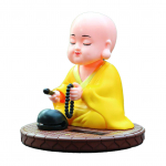 V&auml;ike munk p&auml;ikesepaneeliga ornament automaatselt noogutav koputav Buddha kuju m&auml;nguasi auto armatuurlauale, koju lauale kollane