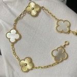 Uus versioon Neljaleheline ristik Viie &otilde;iega k&auml;ev&otilde;ru Naturaalne punane ahhaat Valge p&auml;rlmutter K&auml;ev&otilde;ru Naiste laserk&auml;ev&otilde;ru V Gold